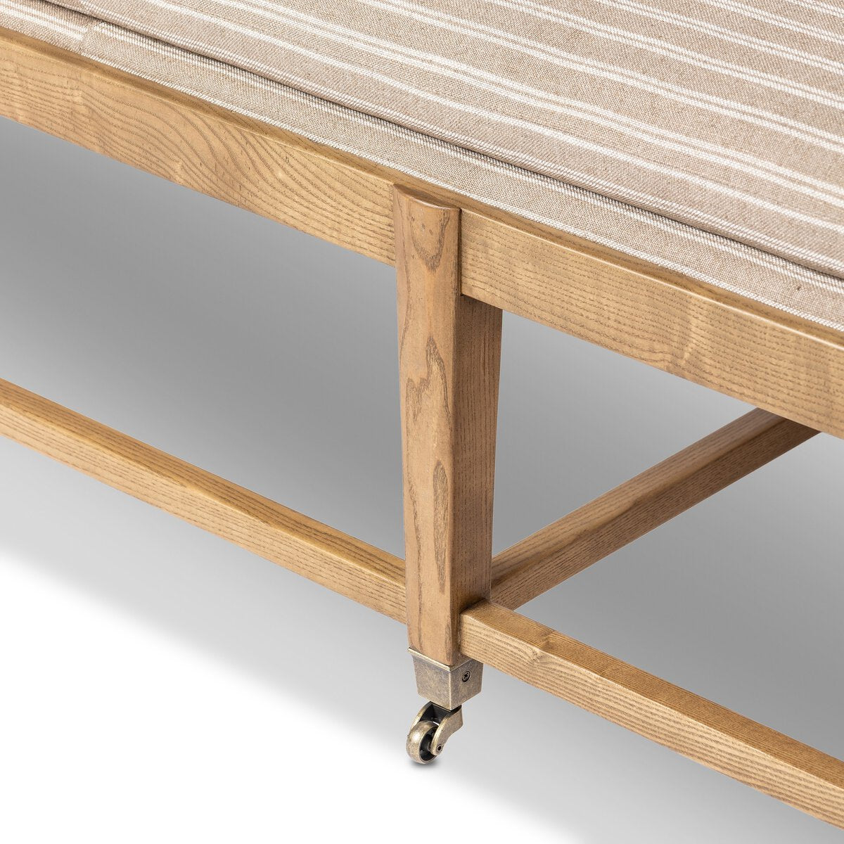 Eleanor Six-Leg Accent Bench with Semi-Attached Cushion and Aged Brass Casters